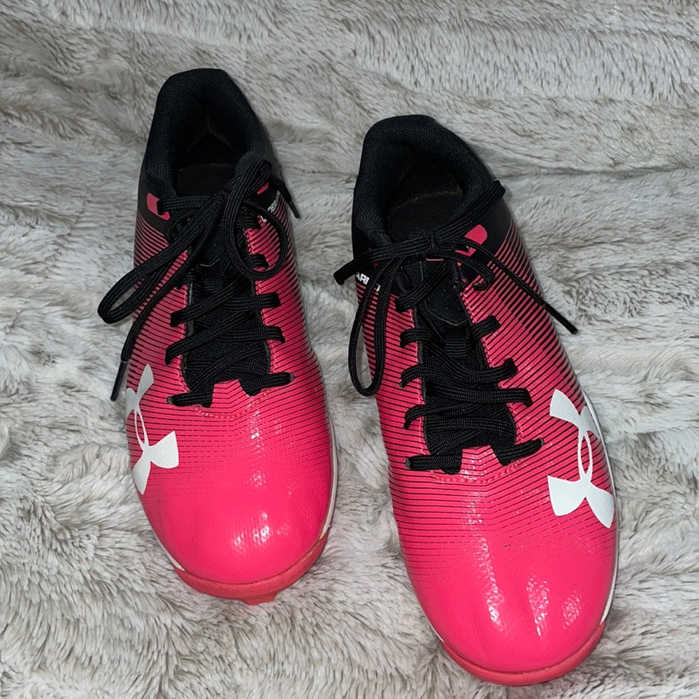 Under Armour, girls softball shoes, size 4 youth.
